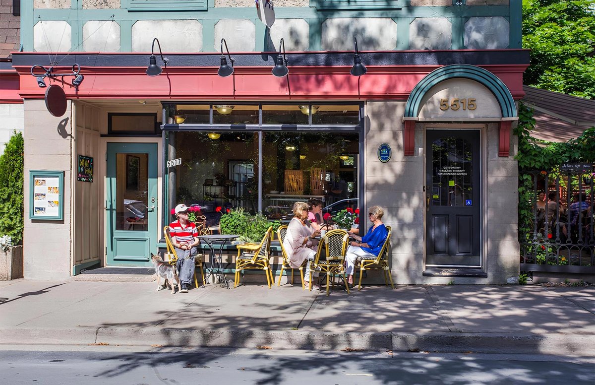 Guests at the sidewalk tables outside Lucy's Hydrostone Café on Young Street